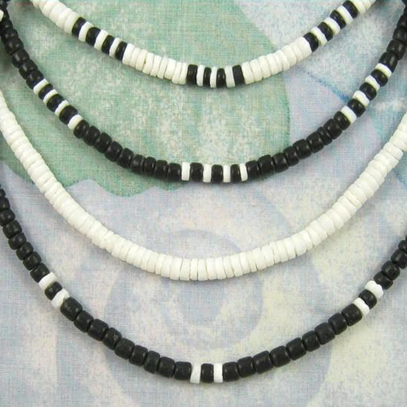 Native Treasure (4 Pack) Mens and Womens Summer Beach Surfer Necklaces From the Philippines, Black Coconut Beads with White Clam Heishe Ark Shells, Mens Summer Necklaces