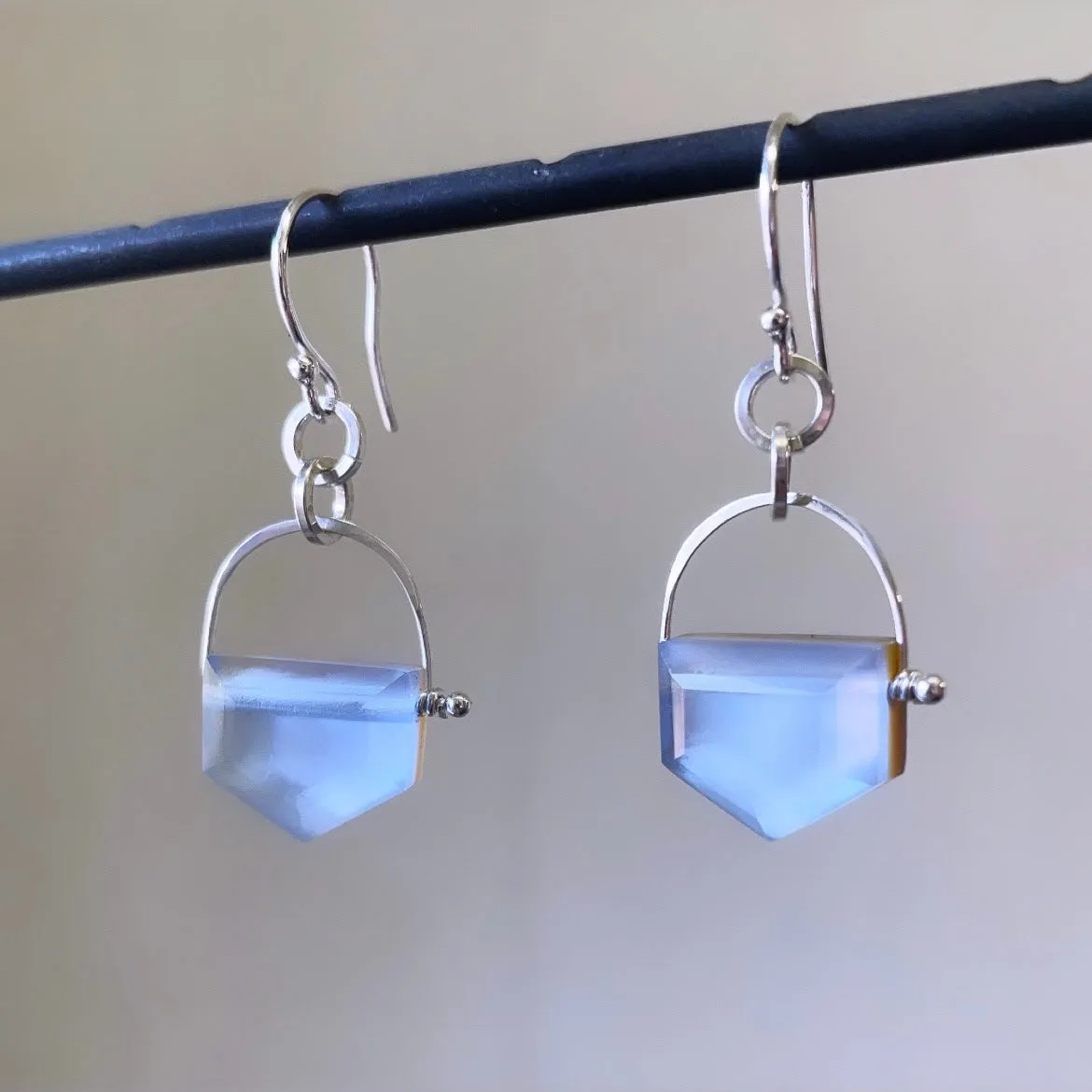 Stirrup arrow mother of pearl doublets