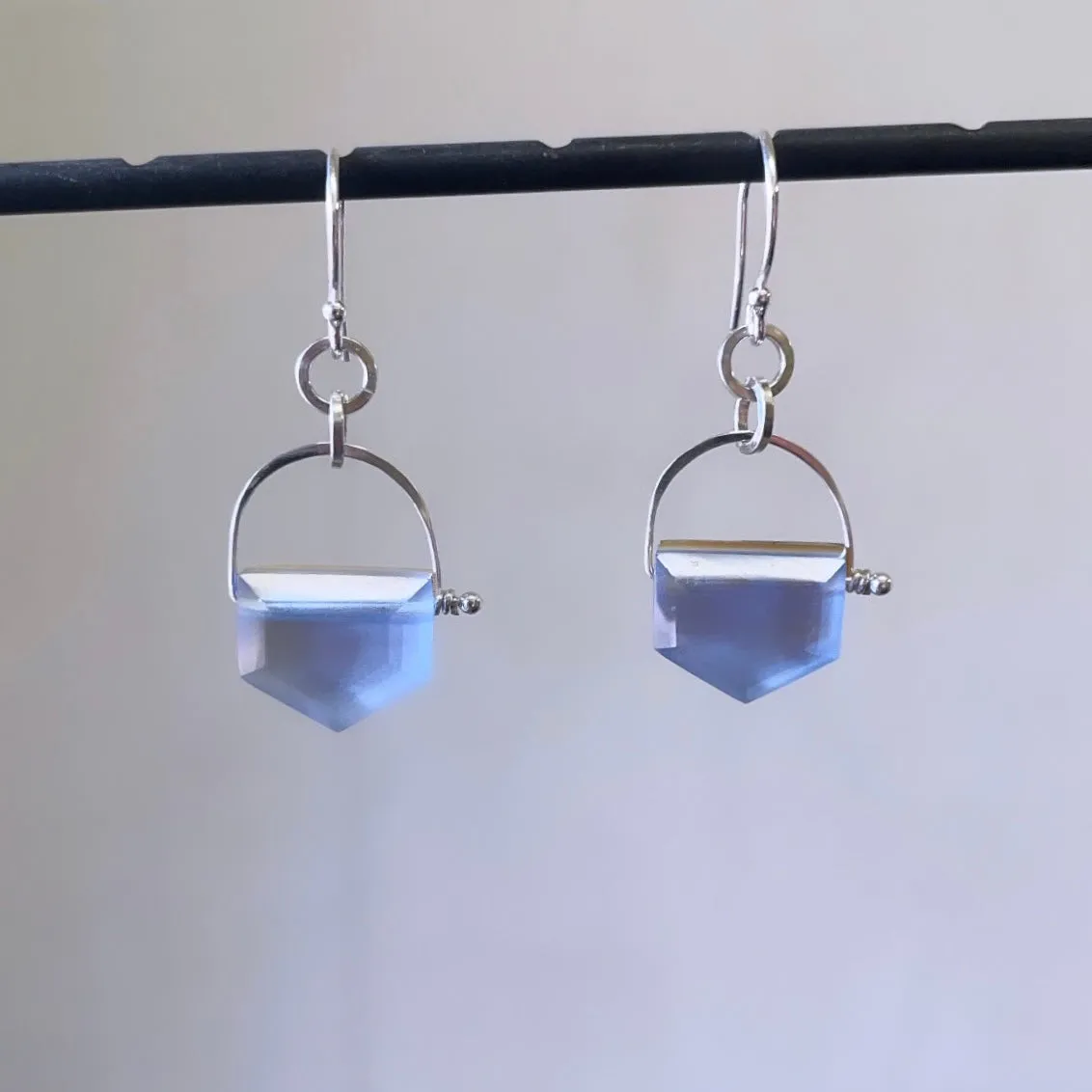 Stirrup arrow mother of pearl doublets